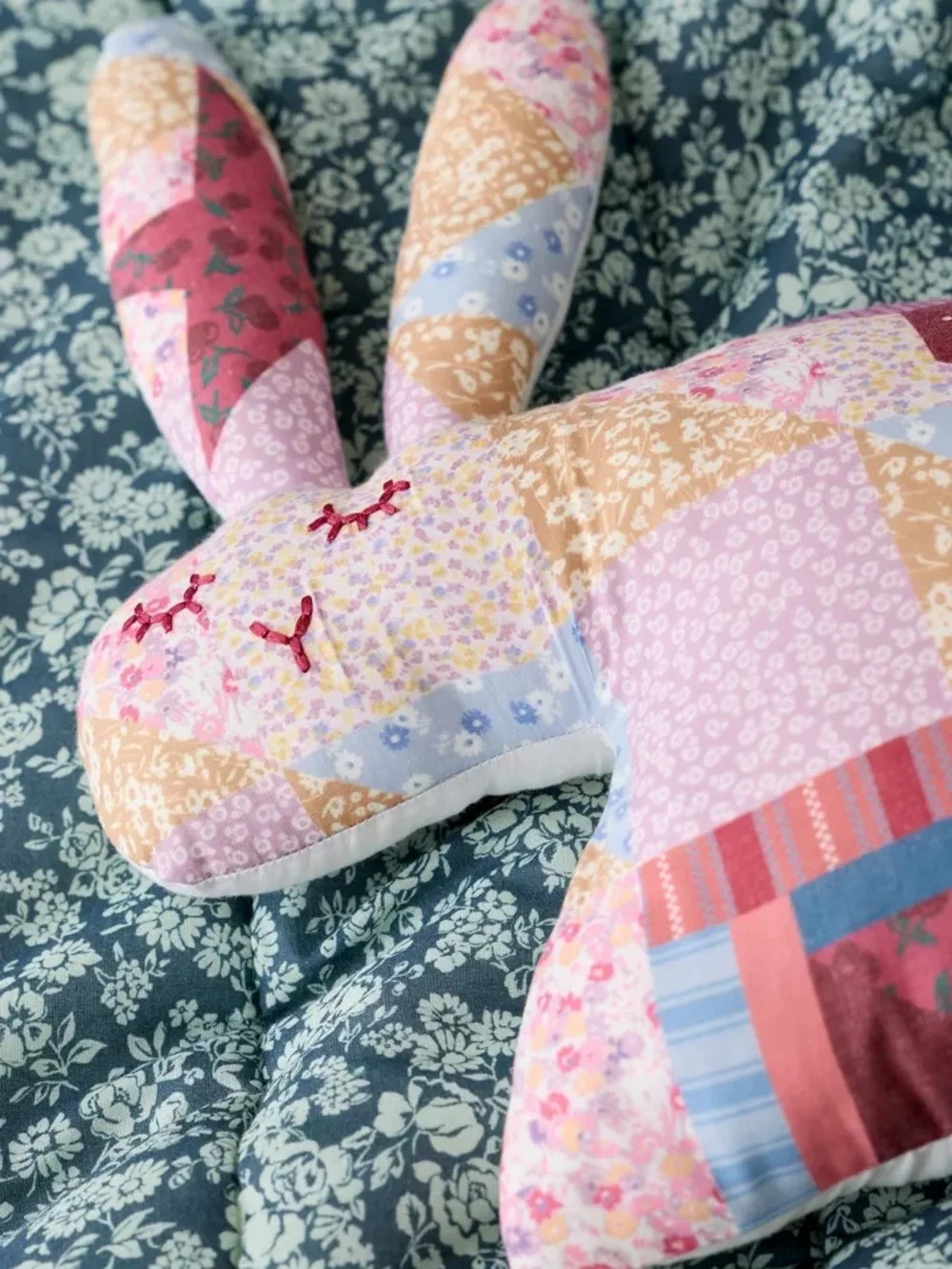 Urban Outfitters Patchwork Bunny Bolster Pillow